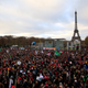 Activists gathered near the Eiffel tower last December to draw attention to populations threatened by climate change as the Paris climate talks were underway. Photo: AP